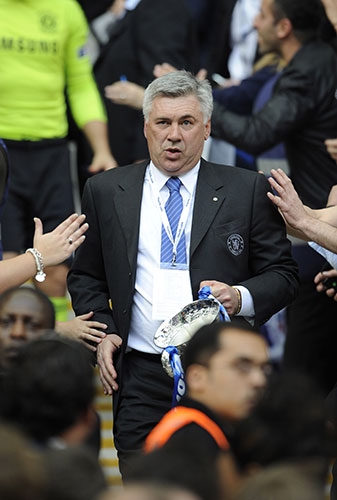 FA Cup Final: Carlo Ancelotti carries the trophy down from the Royal Box