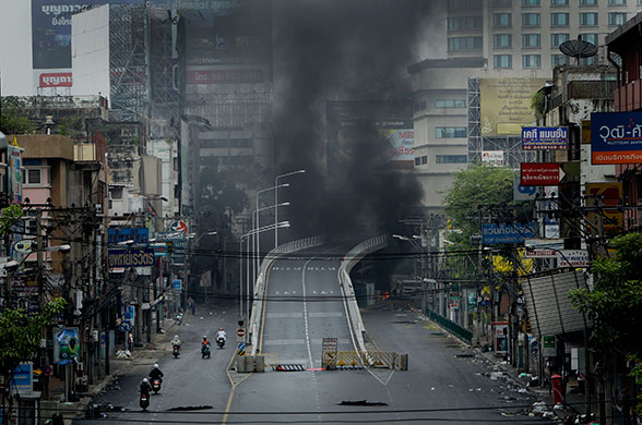 Thailand protests: Smoke rises from burning tires in Bangkok