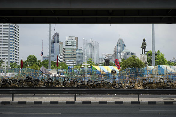 Thailand protests: An empty street and anti governement barricade in Bangkok