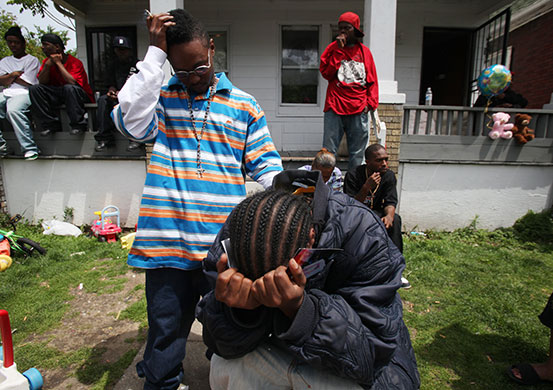 24 hours in pictures: 7-year-old killed by police in Detroit, Michigan, USA