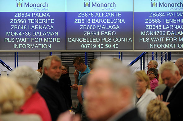 Volcanic ash: Passengers wait for information at Manchester Airport,
