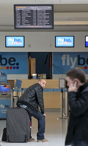 Volcanic ash: Passengers wait for their flights at Belfast City Airport, Northern Ireland