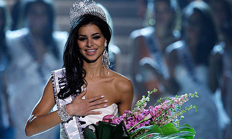 Rima Fakih being 
crowned Miss USA