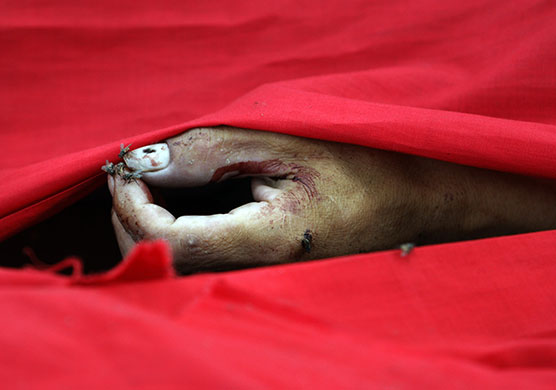 protests in Thailand: The hand of a dead anti-government protester