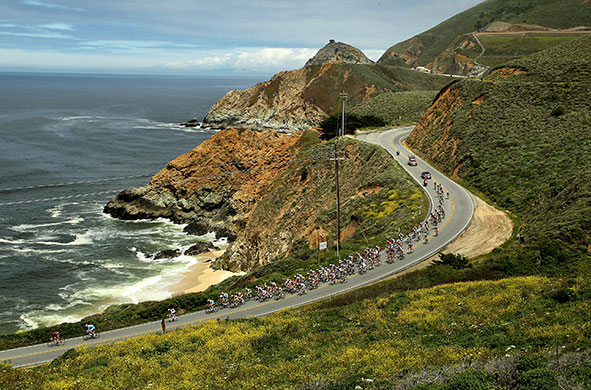 24 sport: The peloton rides along the Pacific Coast during the Tour of California 