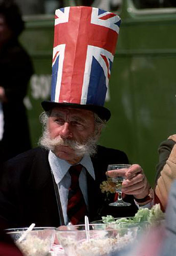 Epsom fashion: Man Wearing Union Jack Hat at the Epsom Derby