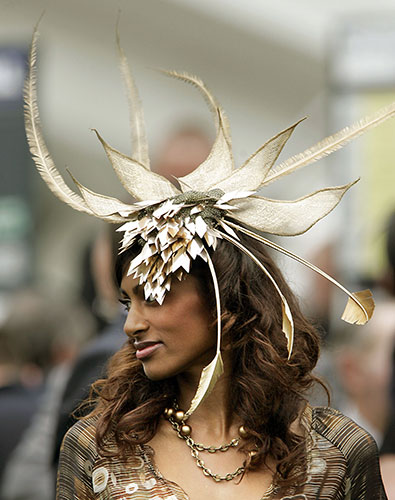 Epsom fashion: A woman in an amazing hat Ladies Day at the Epsom Derby Festival
