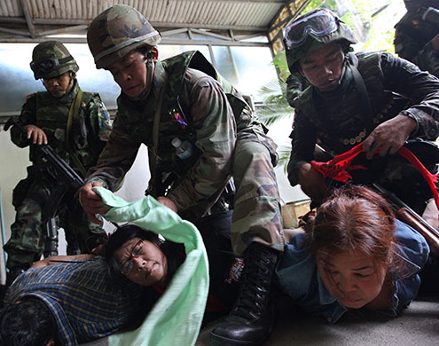 red shirt protesters: Soldiers arrest protesters during a crackdown