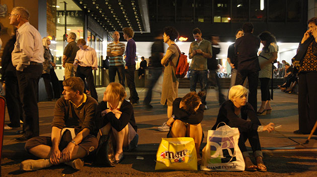 New York car bomb: People rest after being evacuated from the nearby areas of Times Square