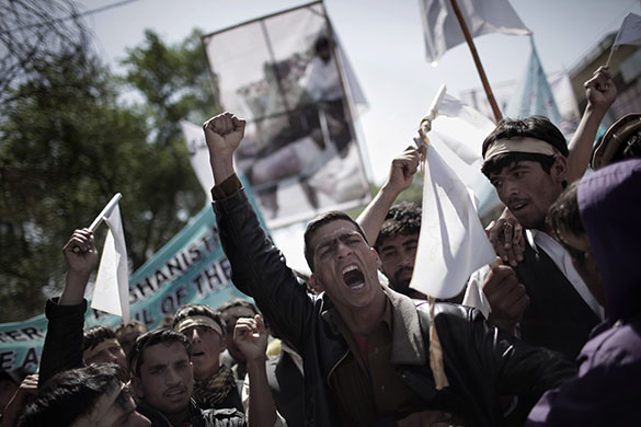 24 hours in pictures: Kabul, Afghanistan: Protestors shout slogans against Mahmoud Ahmadinejad