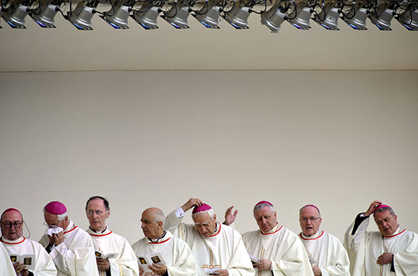 24 hours in pictures: Turin, Italy: Bishops during a mass by Pope Benedict XVI