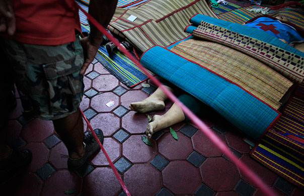 24 hours in pictures: Bangkok, Thailand: The bodies of anti-government protesters lie in a temple