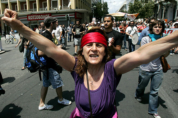 24 Hour Protest: Demonstrators shout slogans in 24 hour protest in Athens, Greece 