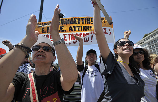 24 Hour Protest: Protesters chant slogans during 24 hour protest in Athens, Greece 