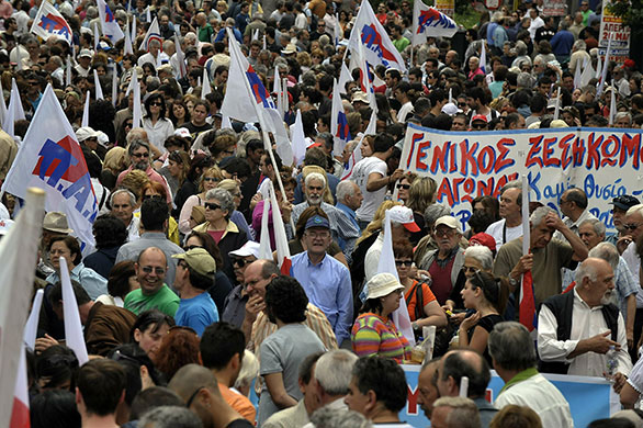 24 Hour Protest: Demonstrators hold flags and banners in 24 hour protest in Athens, Greece 