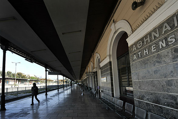 24 Hour Protest: A woman at an empty train station during 24 hour protest in Athens, Greece