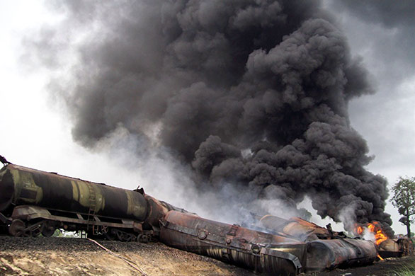 24 hours in pictures: West Champaran, India: Oil wagons on fire after being derailed