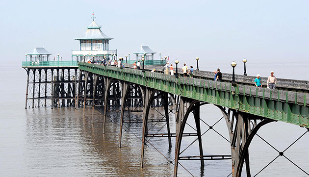 Sunny weather: People enjoy the warm weather on the Victorian Pier at Clevedon