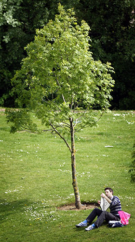 A member of the public enjoys the hot weather in Leith near Edinburgh