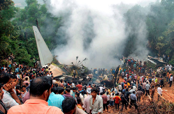 Civilians at the site of the Air India plane crash in Mangalore