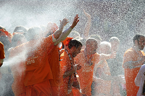 Play Off Final: The champagne comes out as the players celebrate