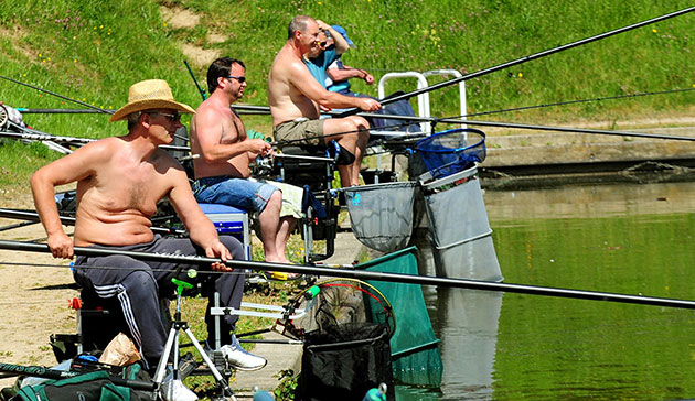weather: Fisherman at Conkers in South Derbyshire