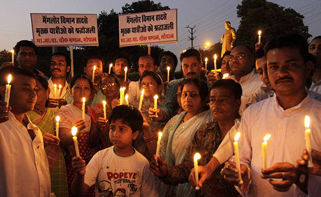 Air India plane crash: Candles to pay tribute to the victims of the Air India flight in Mangalore