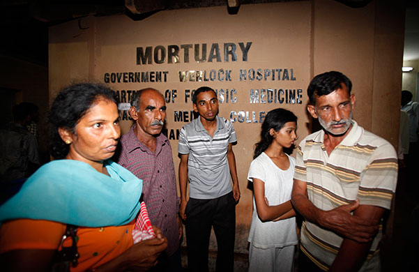 Air India plane crash: Relatives wait to identify the bodies of the Air India plane crash