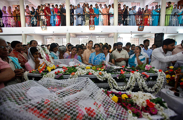 Air India plane crash 2: Relatives grieve next to the bodies of victims who died 