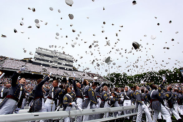 24hours: Graduates throw their hats after the ceremony at the U.S . Military Academy