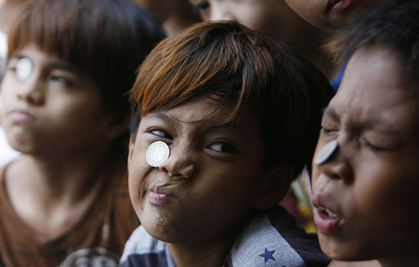 24 hours in pictures: saint Santa Rita de Cascia festival in Baclaran