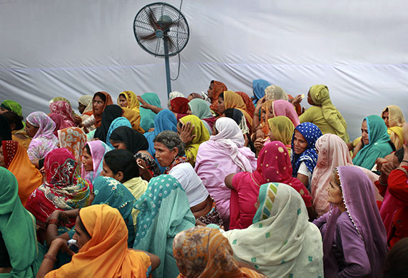 24 hours in pictures: New Delhi, India: Bharatiya Janata Party's women supporters