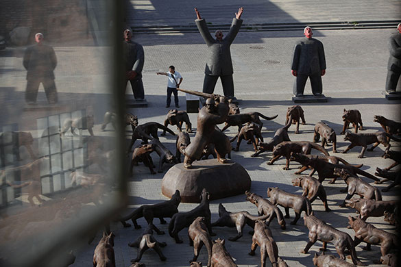 24 hours in pictures: Beijing, China: Sculptures by Liu Ruowang