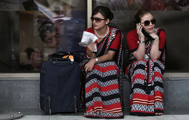 24 hours in pictures: New Delhi, India: Air India air hostesses
