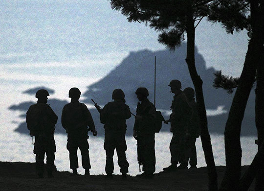 Korea crisis: South Korean marines patrol on near the disputed border with North Korea