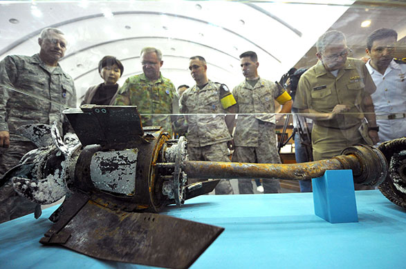 Korea crisis: Officers from the U.N. inspect an alleged North Korean torpedo