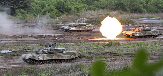 Korea crisis: South Korean Army tanks fire during a drill 