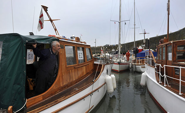 Dunkirk little ships: A sailor aboard an original Dunkirk boat prepares to depart for Dunkirk
