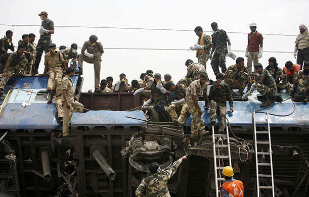India train crash: Soldiers conduct rescue operations at the site