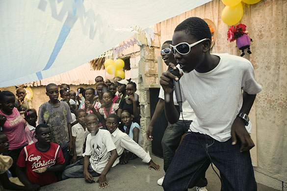 Haiti Schools Rebuild: Two boys perform in a class