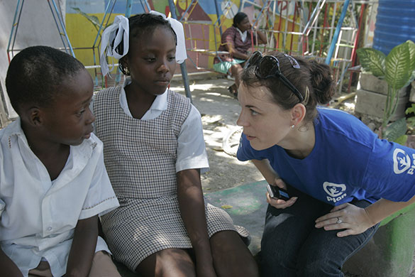 Haiti Schools Rebuild: A social careworker talks to two pupils