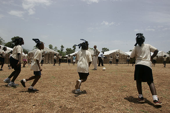Haiti Schools Rebuild: Children play football at an education camp