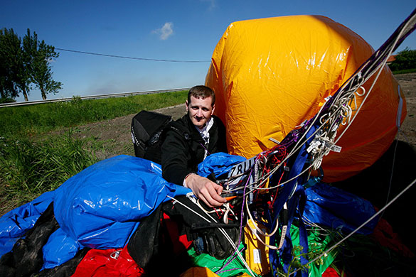 Channel crossings: 2010: Jonathan Trappe with his balloon after landing on farmland