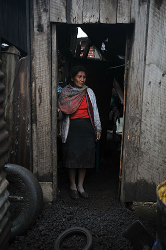 24 Hours in Pictures: A woman looks at the damage caused by the eruption of the Pacaya volcano