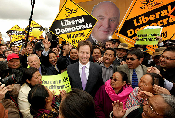 Election week five: Nick Clegg poses for a photograph with Gurkha soldiers and their relatives 
