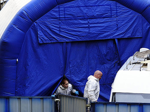 Bradford murders: Police forensic officers work near the apartment of Stephen Griffiths