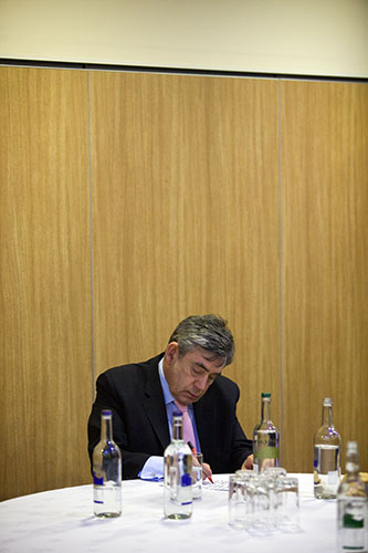 Martin Argles election: 1 May: Prime Minister Gordon Brown makes notes before a poster launch