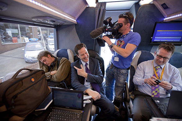 Campaigning with Clegg: Nick Clegg jokes around with a sleeping soundman on the tour bus