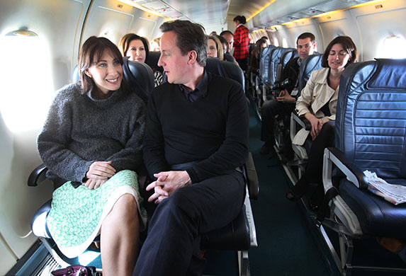 Cameron campaign trail: David Cameron with his wife Samantha on flight back from Blackpool