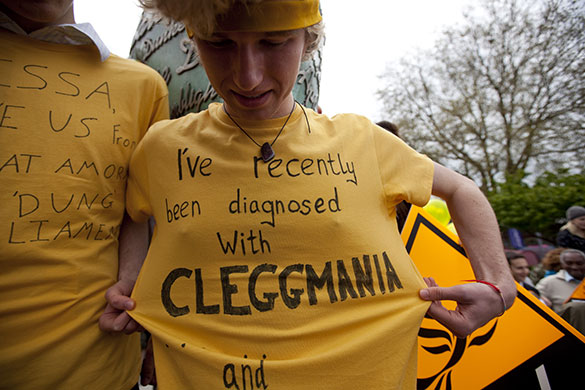 Campaigning with Clegg: Liberal Democrat supporters in t shirts at Clarks Village outlet centre